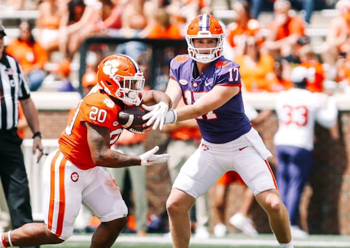Christopher Vizzina hands the football off to Domonique Thomas during Clemson's Orange and White Game (Clemson Athletics)
